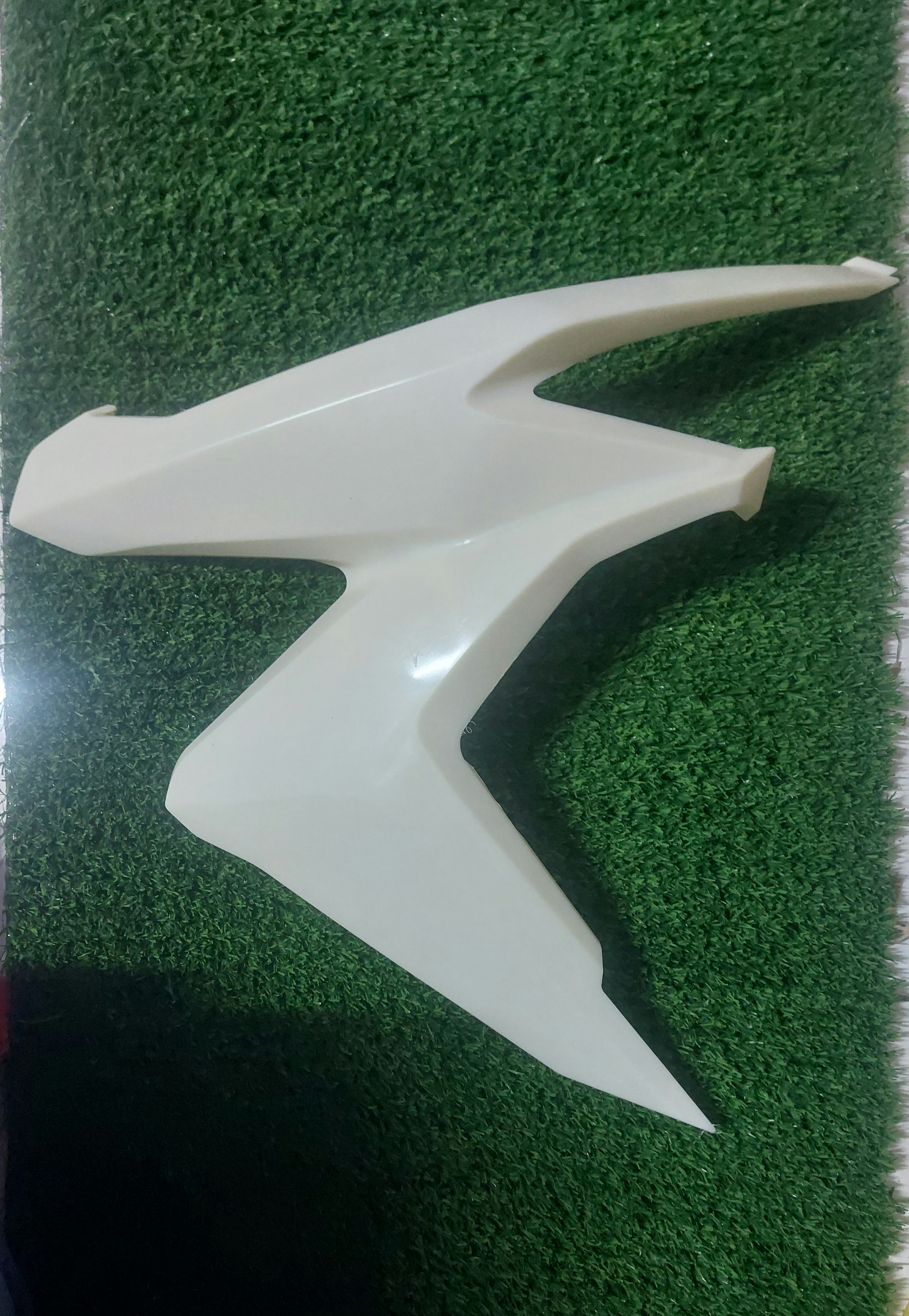 فلاپ بغل چراغ سمت چپ موتورسیکلت طرح کلیک بی رنگ(خام)